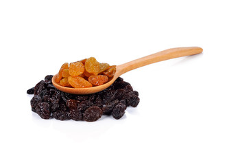 Dried raisins on a white background