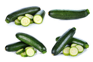 green zucchini vegetables isolated on white