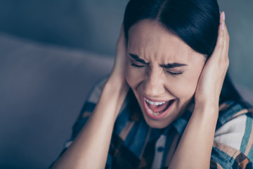 Close up photo beautiful she her lady arm hold hide ears eyes closed terrible suffer pain...