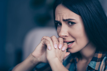 Close up side profile photo beautiful she her lady displeased hopeless bite teeth hands palms...