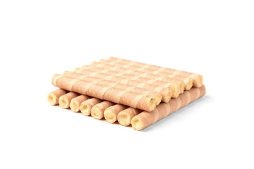Sweet chocolate waffle rolls isolated on white background.