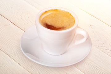 Coffee cup  on wooden background