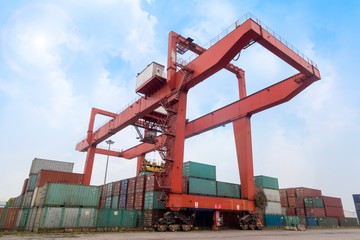 Fototapeta na wymiar cargo container with port crane in port