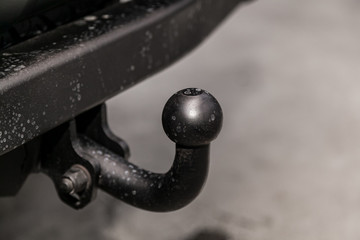 Close up, black car  tow hitch.view of the vehicle hitch closeup