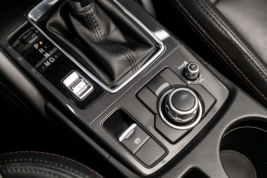 Automatic gear stick inside modern car.  automatic transmission gear of car , car interior. Off road and parking systems buttons