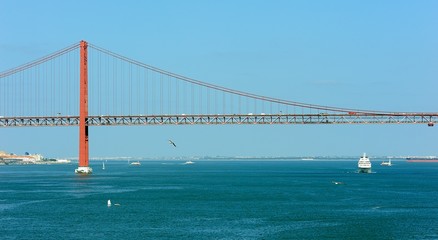Windstar Cruises Star Breeze lsailing under the April 25 Bridge
