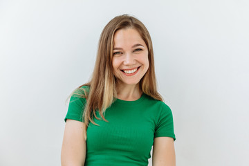 Young girl portrait against white background. Laughter and joy emotions
