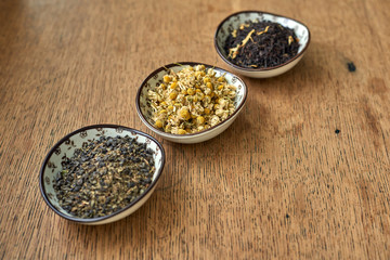Earl Grey and Chamomile tea on a wooden table 