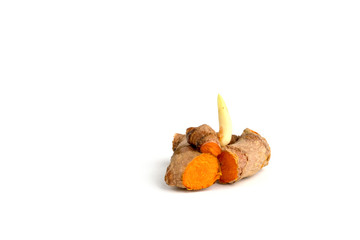 Cutting of turmeric curcumin root on isolated white background.