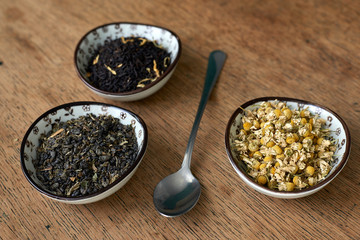 Earl Grey and Chamomile tea on a wooden table 