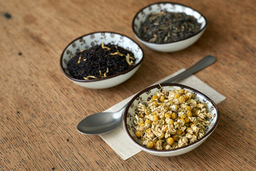 Earl Grey and Chamomile tea on a wooden table 