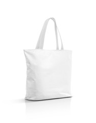 Blank white canvas tote bag isolated on white background