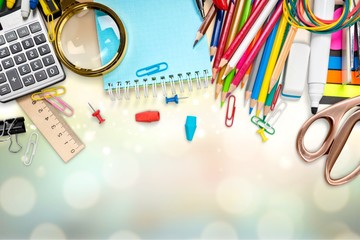 Assortment  of School supplies on  background