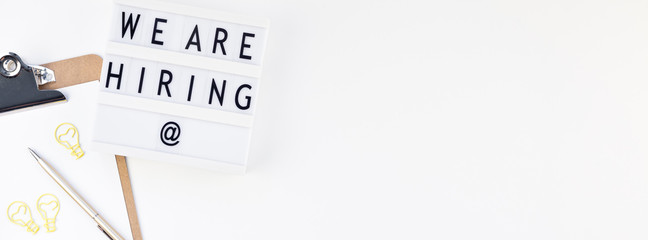 We are hiring flat lay on white background