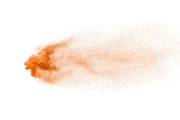 Explosion of brown powder on white background.