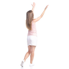 Woman in skirt showing pointing on white background isolation, back view