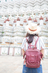 Asian backpack tourost women travel in temple of buddism