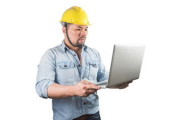 Young construction workers in hard hats on