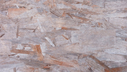 Texture of brown flat pressed wood.