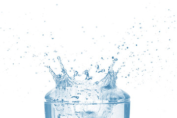Top of transparent glass and blue water splash isolated on white background.