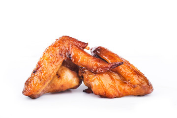 Honey-boiled chicken wings on a white background