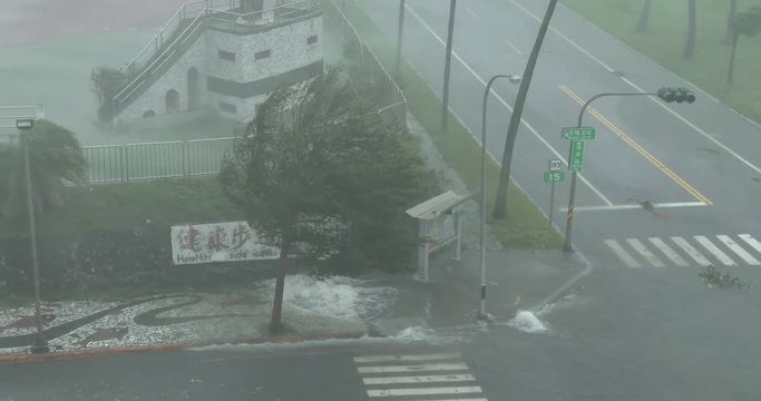 Flood Water Bursts From Drain As Hurricane Dumps Heavy Rain - Megi