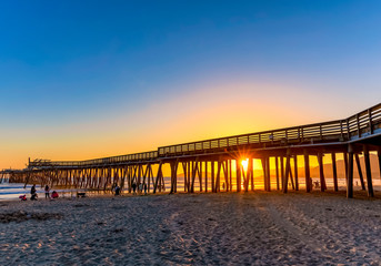 Sunset at beach with Pier