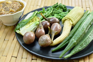 spicy shrimp paste sauce eat with mixed boiled vegetable on plate