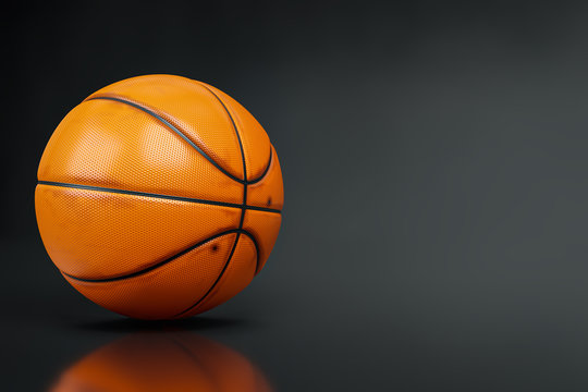 3d rendering close-up shot of Basketball on dark studio shot background with clipping paths.
