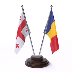 Georgia and Romania, two table flags isolated on white background. 3d image