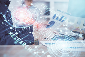 Multi exposure of tech drawings with man working on computer background. Concept of innovation.