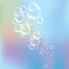 Fototapeta na wymiar Realistic transparent floating soap bubbles. Design element for advertising booklet, flyer or poster