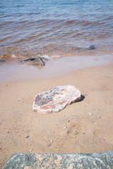 coastal granite stones washed by the waves
