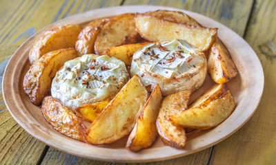 Baked Camembert cheese with potato