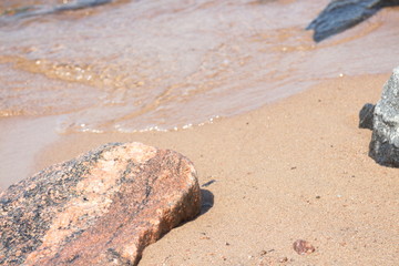 coastal granite stones washed by the waves