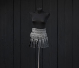 gray denim skirt on mannequin
