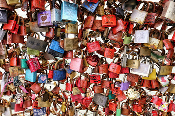 Plenty of love padlocks on the bridge railing