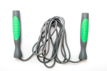 Jump rope on white background, top view