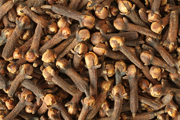 Top view on a pile of dry spice cloves