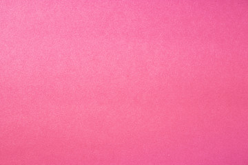 Recycled craft paper textured background in light pink old rose color