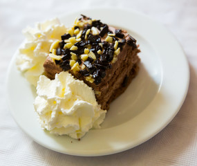 Chocolate cake with whipped cream