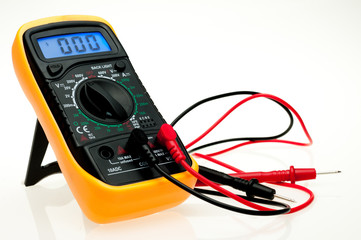 Digital multimeter with probes and blue backlit display on a white background - obrazy, fototapety, plakaty
