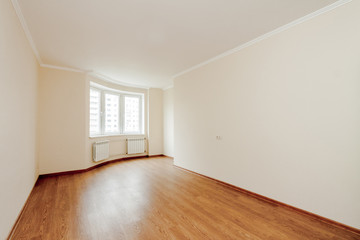 Empty light room with wide white window