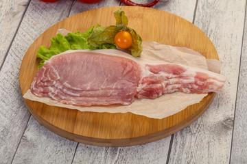 Raw pork bacon