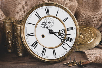 Antique wall clock face with accessories 