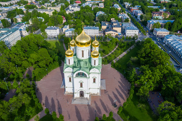 Aerial view of the Orthodox church, cathedral with golden crosses and domes in the city of Pushkin....