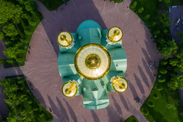 Aerial view of the Orthodox church, cathedral with golden crosses and domes in the city of Pushkin....
