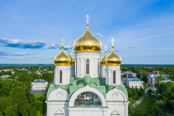 Aerial view of the Orthodox church, cathedral with golden crosses and domes in the city of Pushkin....