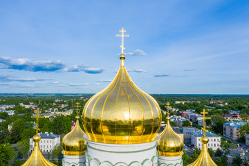 Aerial view of the Orthodox church, cathedral with golden crosses and domes in the city of Pushkin....