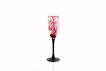 glass red black wine white background close up fougere paint smoke streak purple